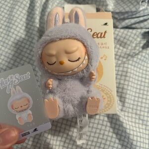 Zizi have a seat Labubu